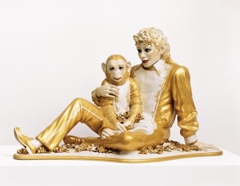 Jeff Koons' porcelain and gold lifesize sculpture, "Michael Jackson and Bubbles," is on exhibit in Versailles, France.
